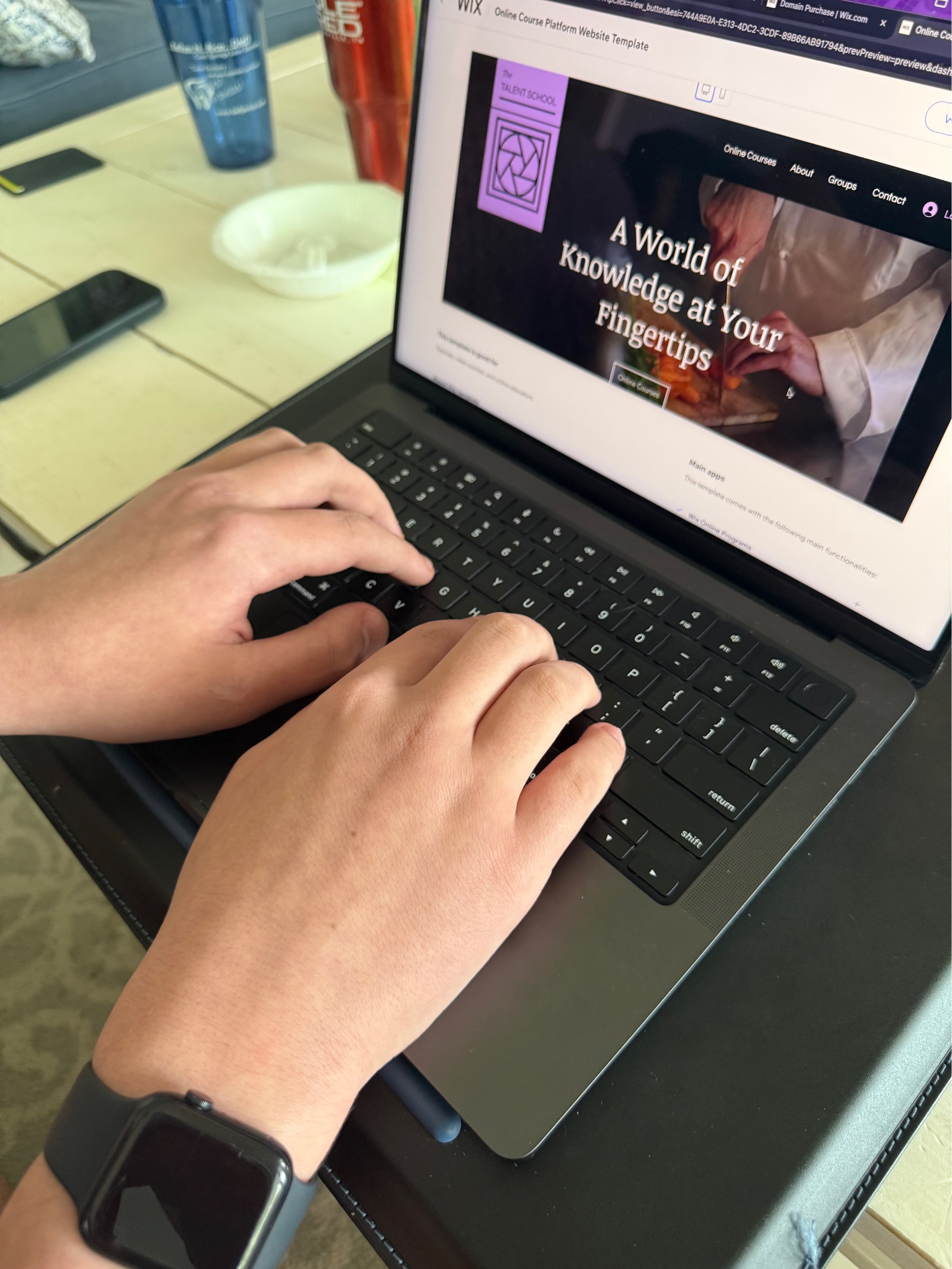 Me typing at my laptop